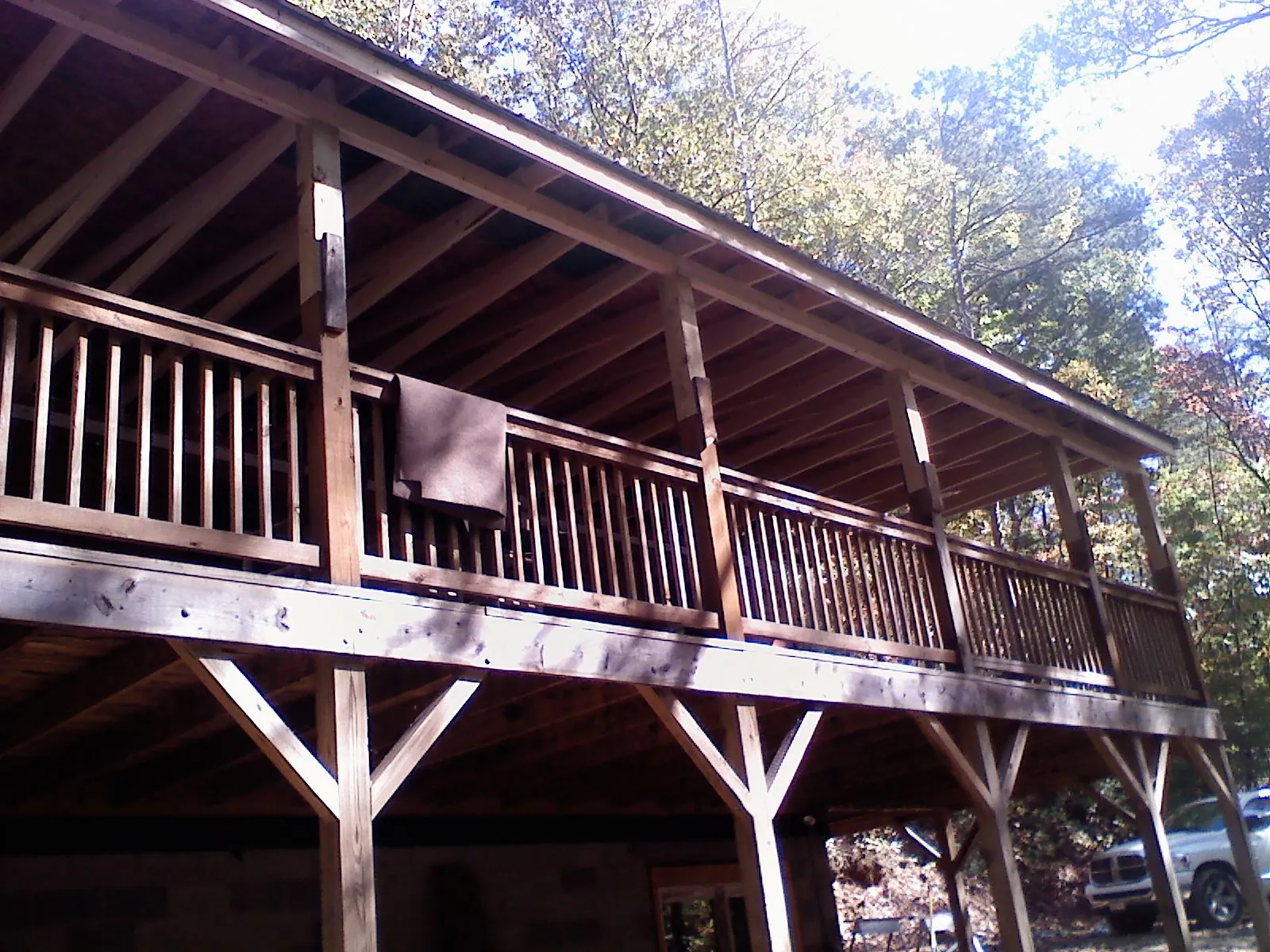 Timber framing under a new elevated porch and deck — Roof Leak Repair in Rocky by Roofing Brothers